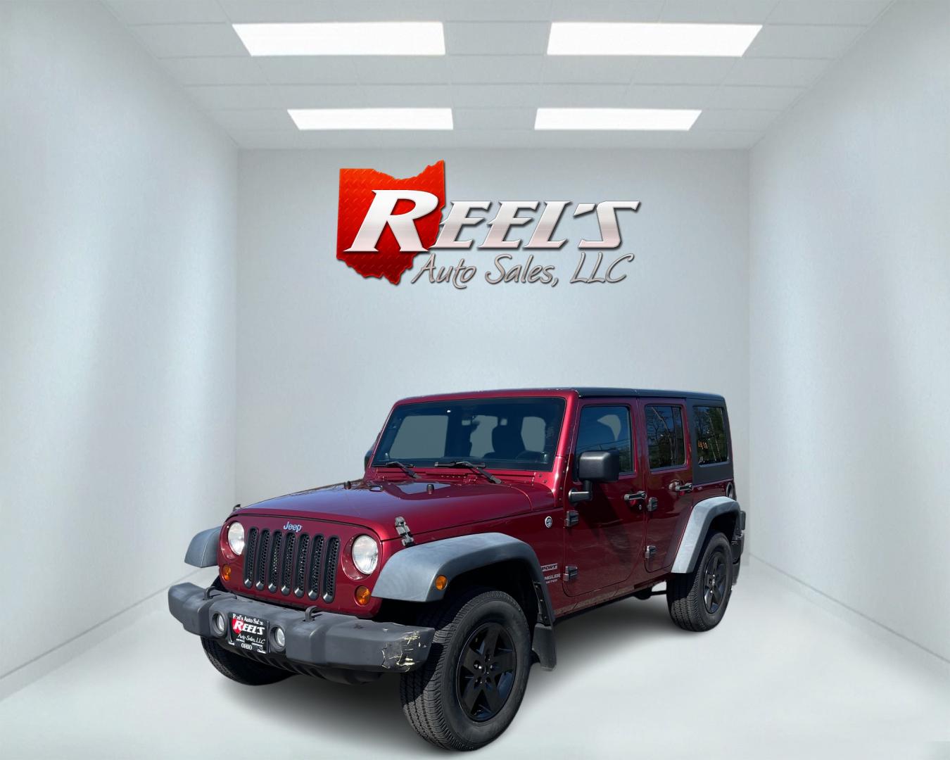 2012 Red /Black Jeep Wrangler Unlimited Sport 4WD (1C4BJWDG3CL) with an 3.6L V6 DOHC 24V engine, 5-Speed Automatic transmission, located at 547 E. Main St., Orwell, OH, 44076, (440) 437-5893, 41.535435, -80.847855 - This 2012 Jeep Wrangler Unlimited Sport with 4WD features a robust 3.6-liter Pentastar V6 engine paired with a 5-speed automatic transmission. It is equipped with a Dana 44 rear axle and a Dana 30 front axle, ensuring durable and reliable off-road capabilities. The model comes with a hardtop convert - Photo#39